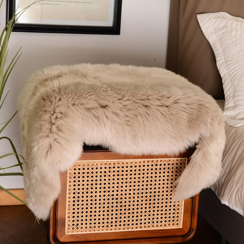 LLB soft-texture sheepskin rug in cream invites lounging and easy pairing