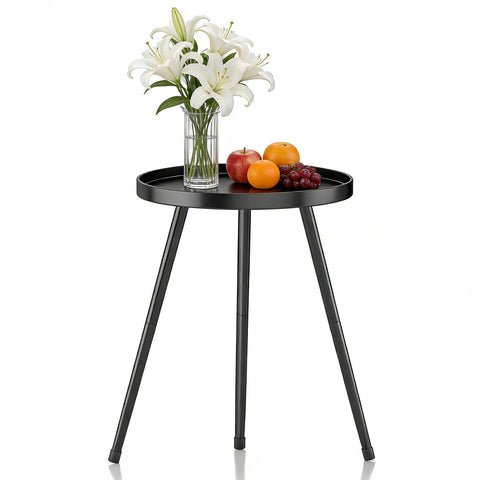 LMGVRZK round side table in black iron, ideal for cozy living spaces.