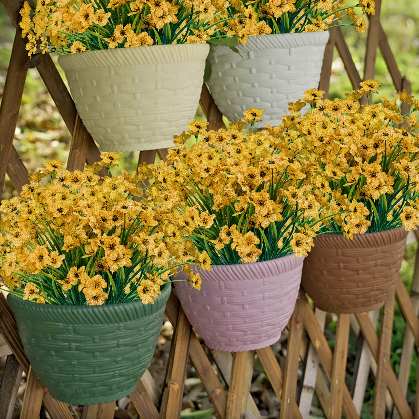 Lnoicy yellow artificial flowers along walkway adding color without watering