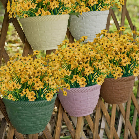 Lnoicy yellow artificial flowers along walkway adding color without watering