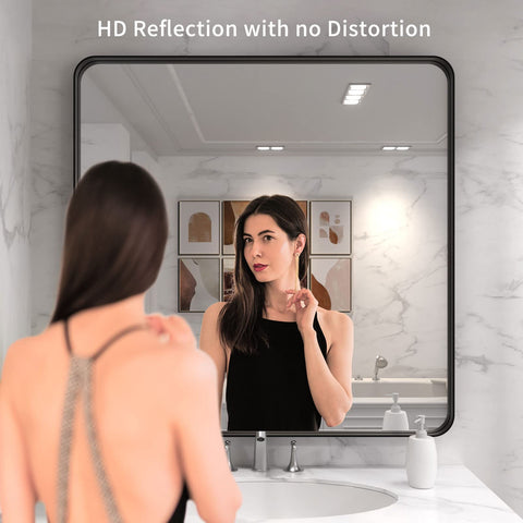 LOAAO matte black frame mirror suited for bathroom vanity with modern style.