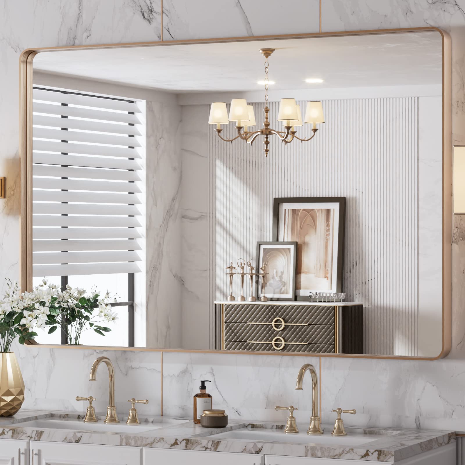 LOAAO rounded rectangle gold frame mirror offers a clear reflection for stylish bathrooms