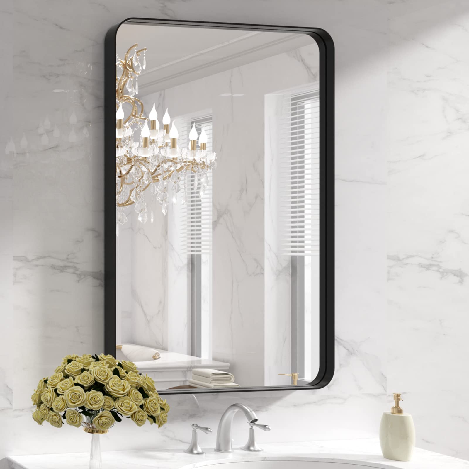 LOAAO black metal framed bathroom mirror with 24x36 inch clear reflection.