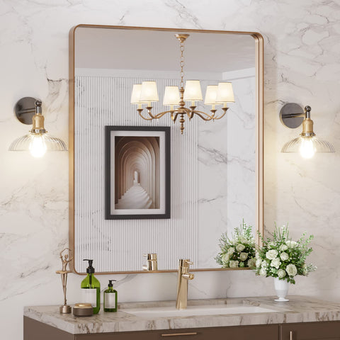 LOAAO gold mirror with rounded frame for wall mounting and distortion-free reflection.
