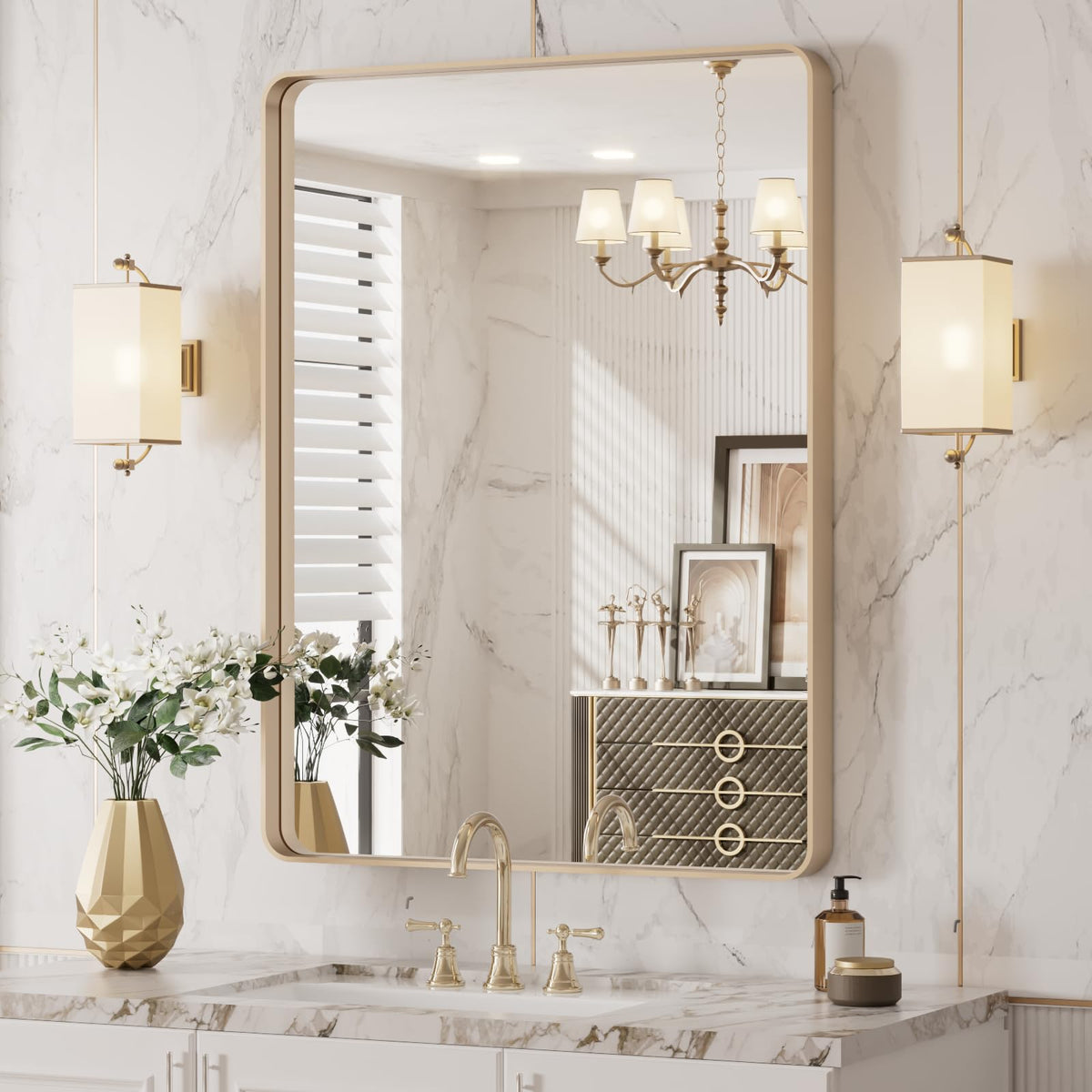 LOAAO rounded-rectangle gold mirror adds a sleek bathroom centerpiece