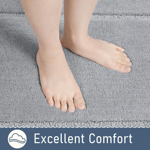 LOCHAS machine-washable rug offers easy care for busy bathrooms.