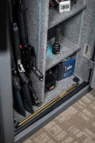 Lockdown Golden Rod Dehumidifier plugged in behind the safe door for simple moisture management.
