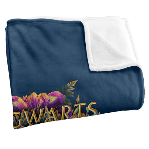 LOGOVISION Hogwarts floral crest throw blanket close-up of microfleece texture