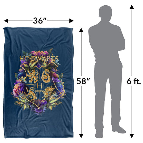 LOGOVISION Hogwarts floral crest throw blanket on couch for movie nights
