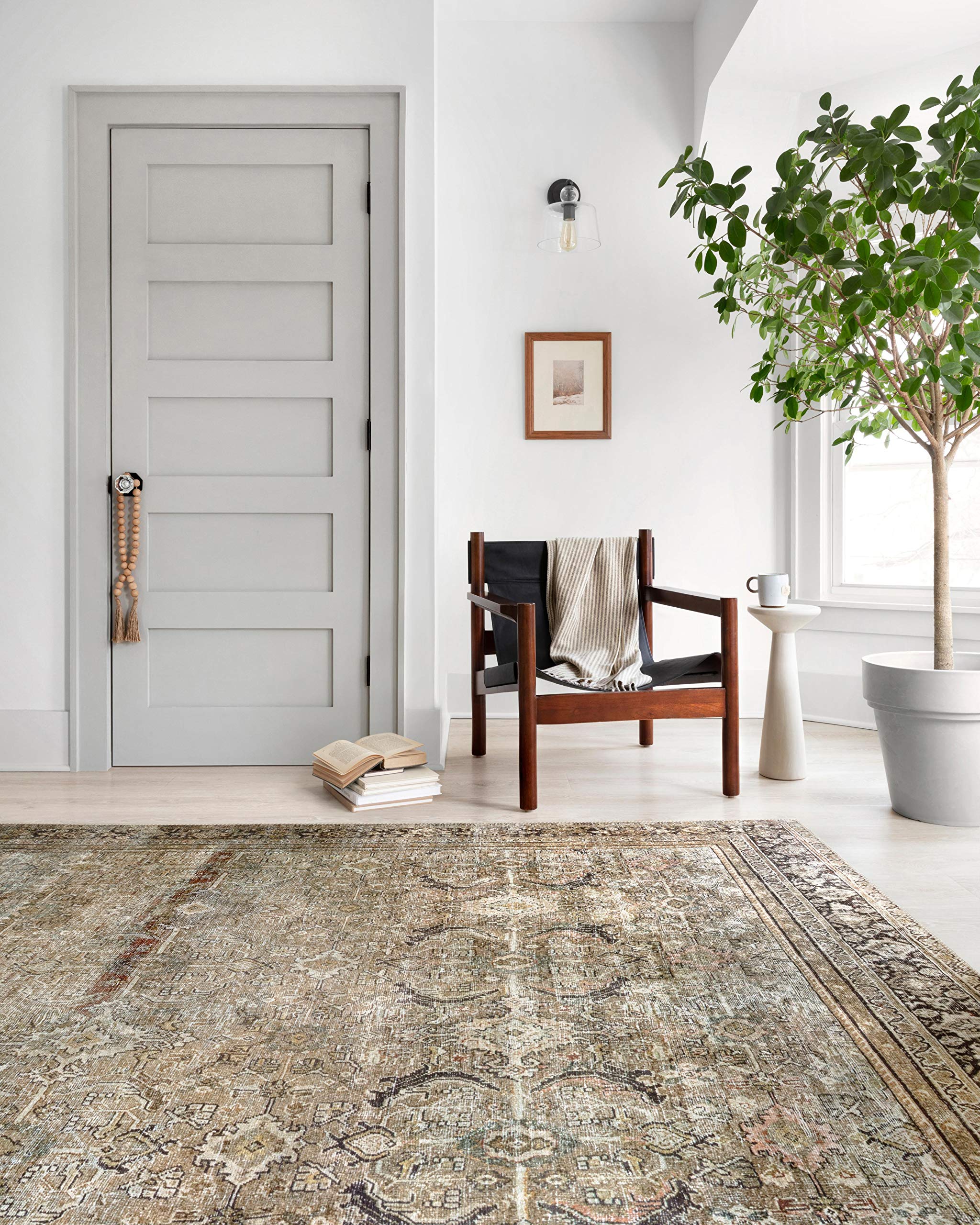 Loloi Layla olive charcoal rug in-room setup demonstrates versatile styling