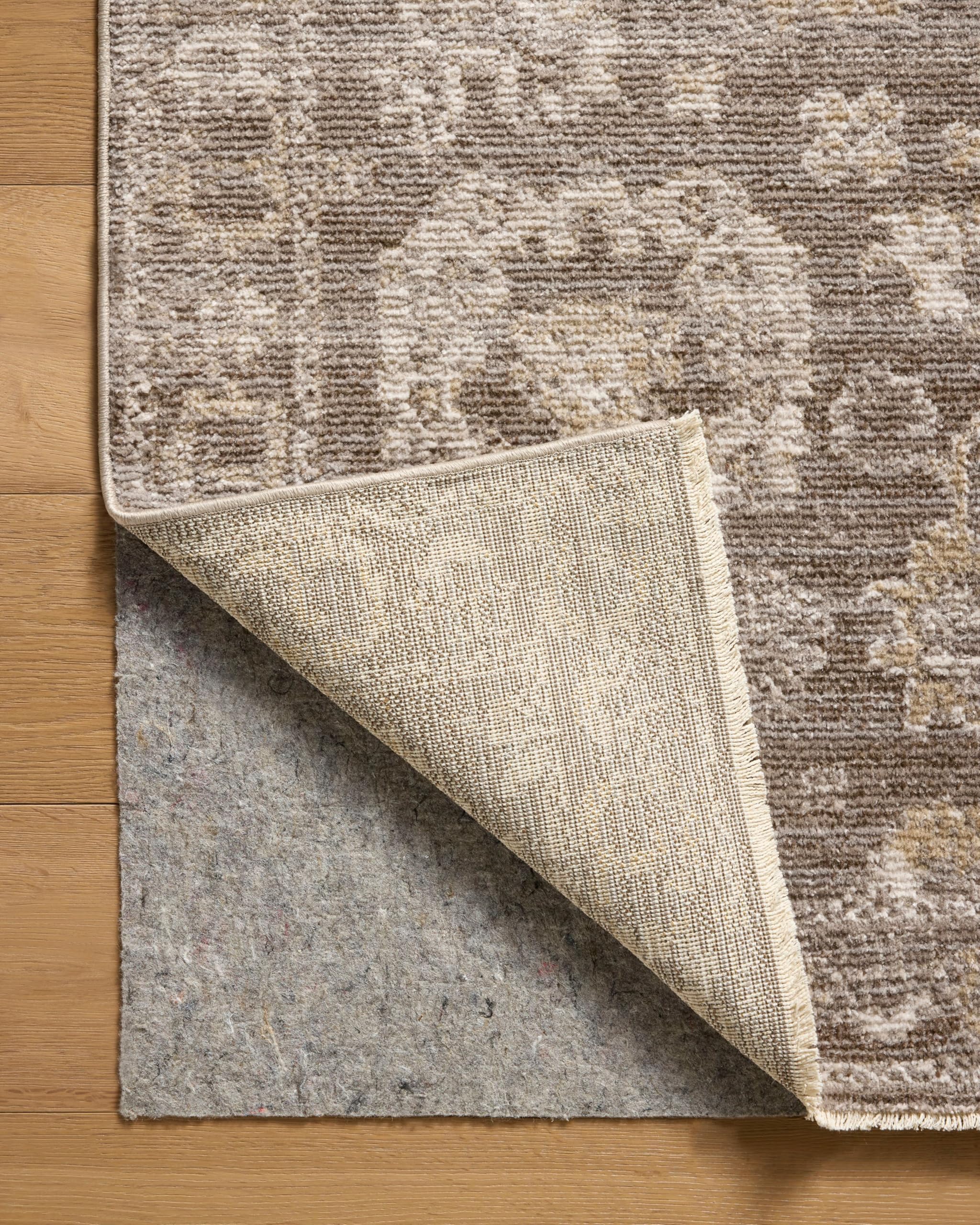 Loloi Magnolia Pace PAC-03 taupe-wheat no-shed rug supports long-lasting resilience.