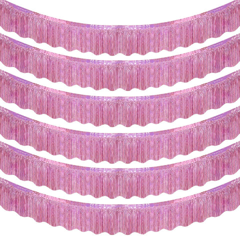 LOLStar pink foil fringe banner creates a festive photo backdrop.