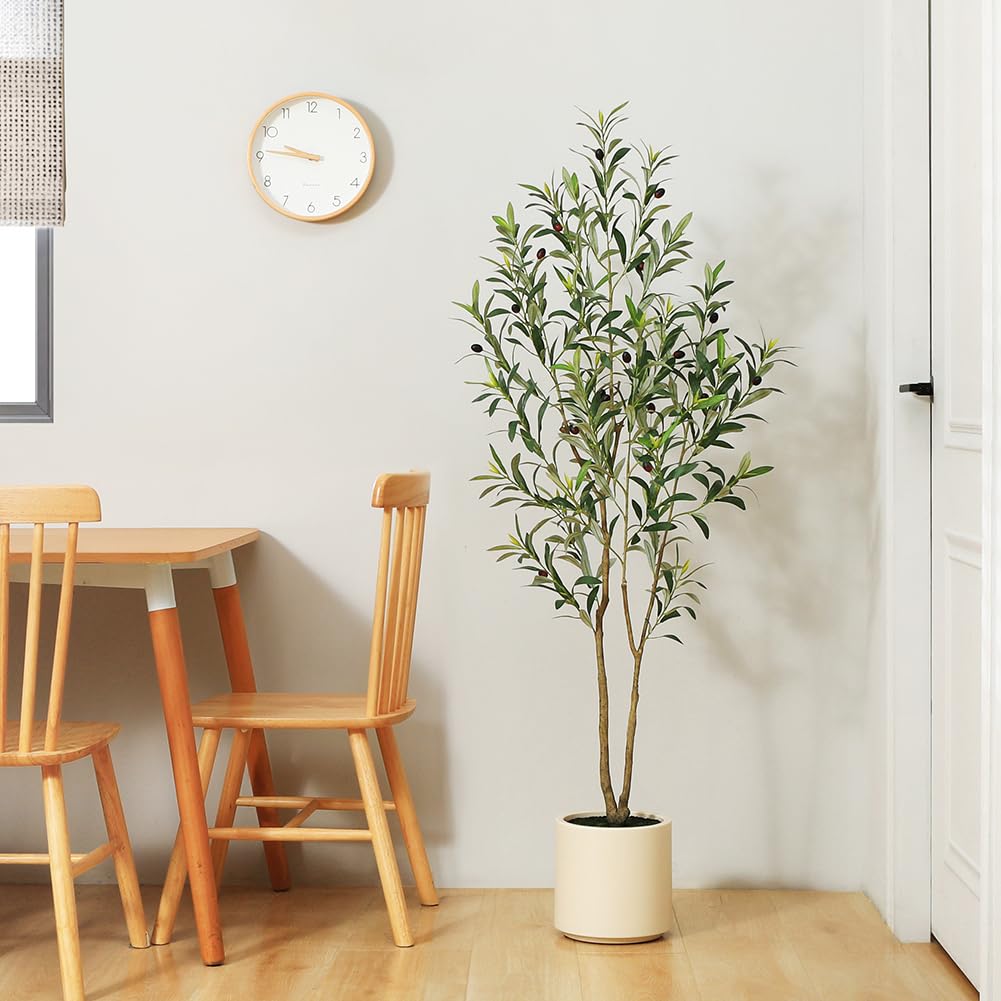 LOMANTO bedroom decor with olive tree adding calming greenery