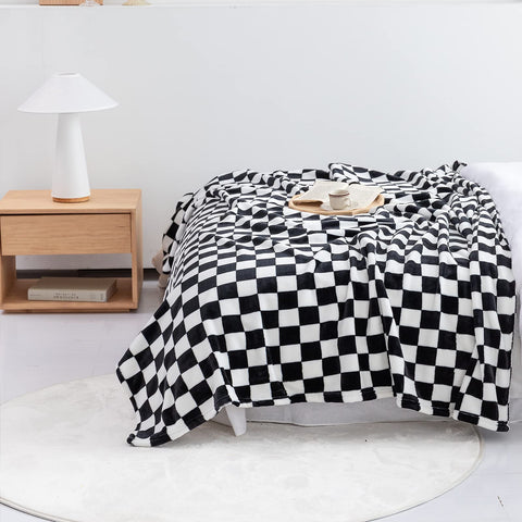 LOMAO black 60x80 blanket adds modern elegance to any room.