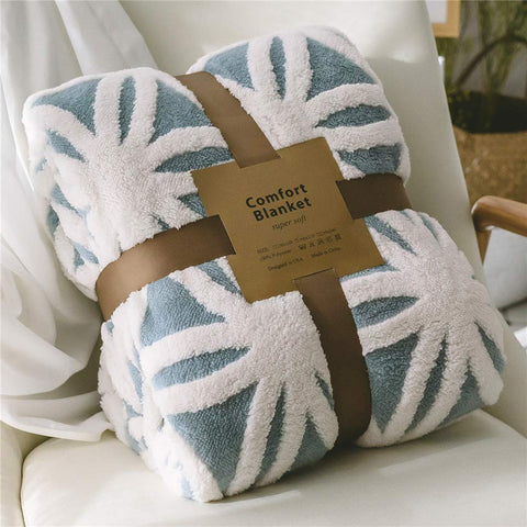 LOMAO Sherpa fleece blanket light blue folded on sofa for cozy warmth