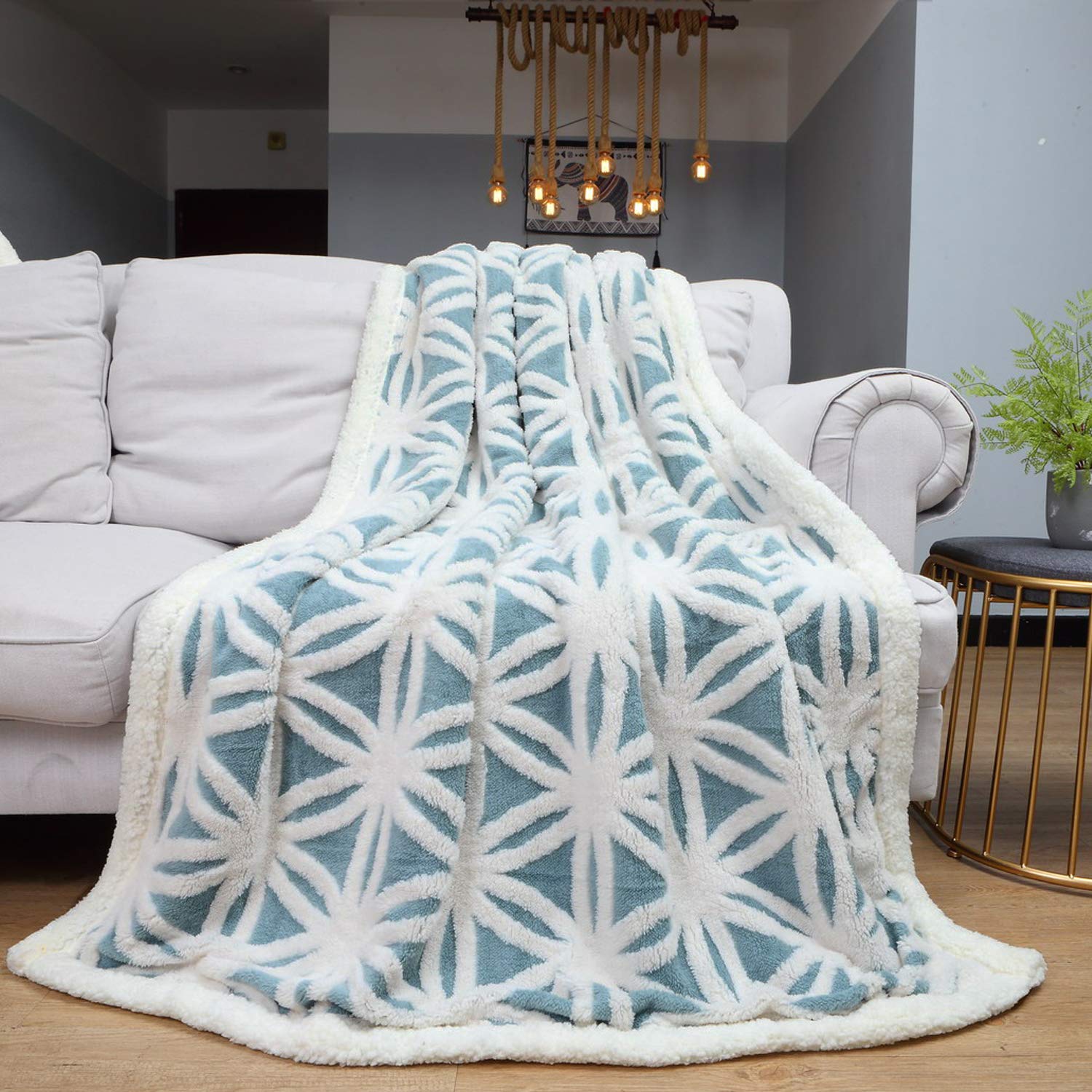 LOMAO Sherpa fleece blanket light blue rolled for easy storage