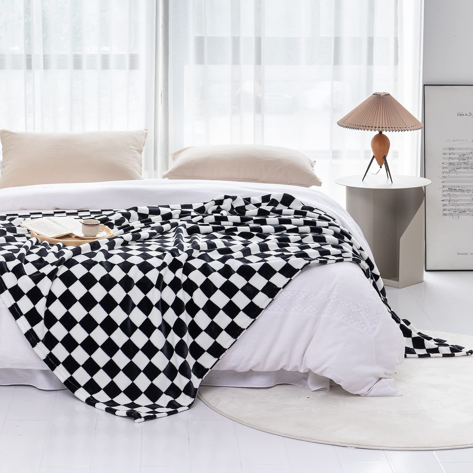 LOMAO soft flannel blanket on couch delivers breathable comfort and cozy texture.