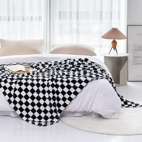 LOMAO soft flannel blanket on couch delivers breathable comfort and cozy texture.