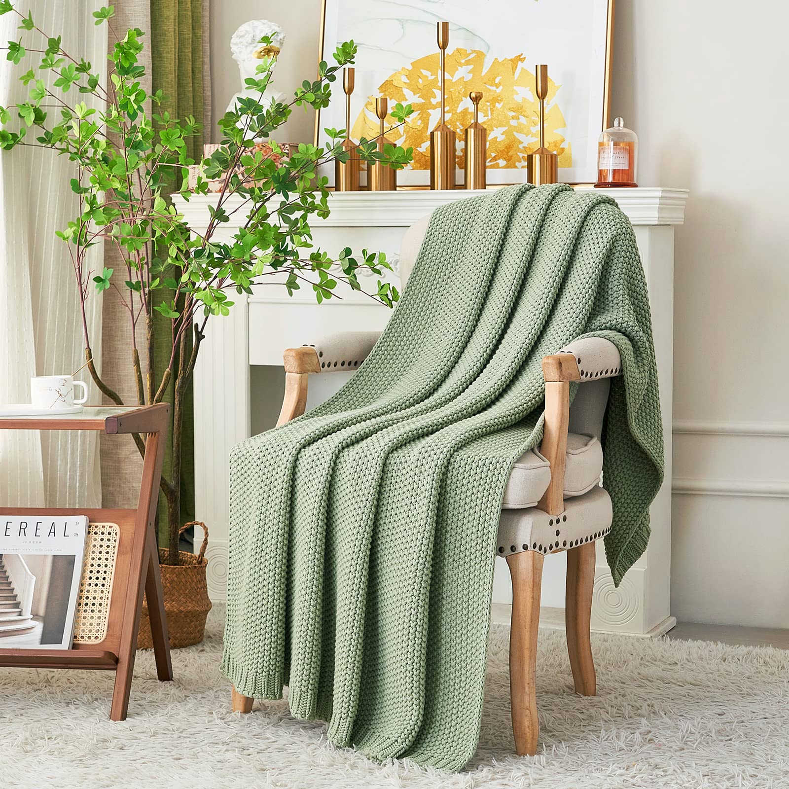 Longhui Bedding throw used on sofa and in nursery for versatile decor.