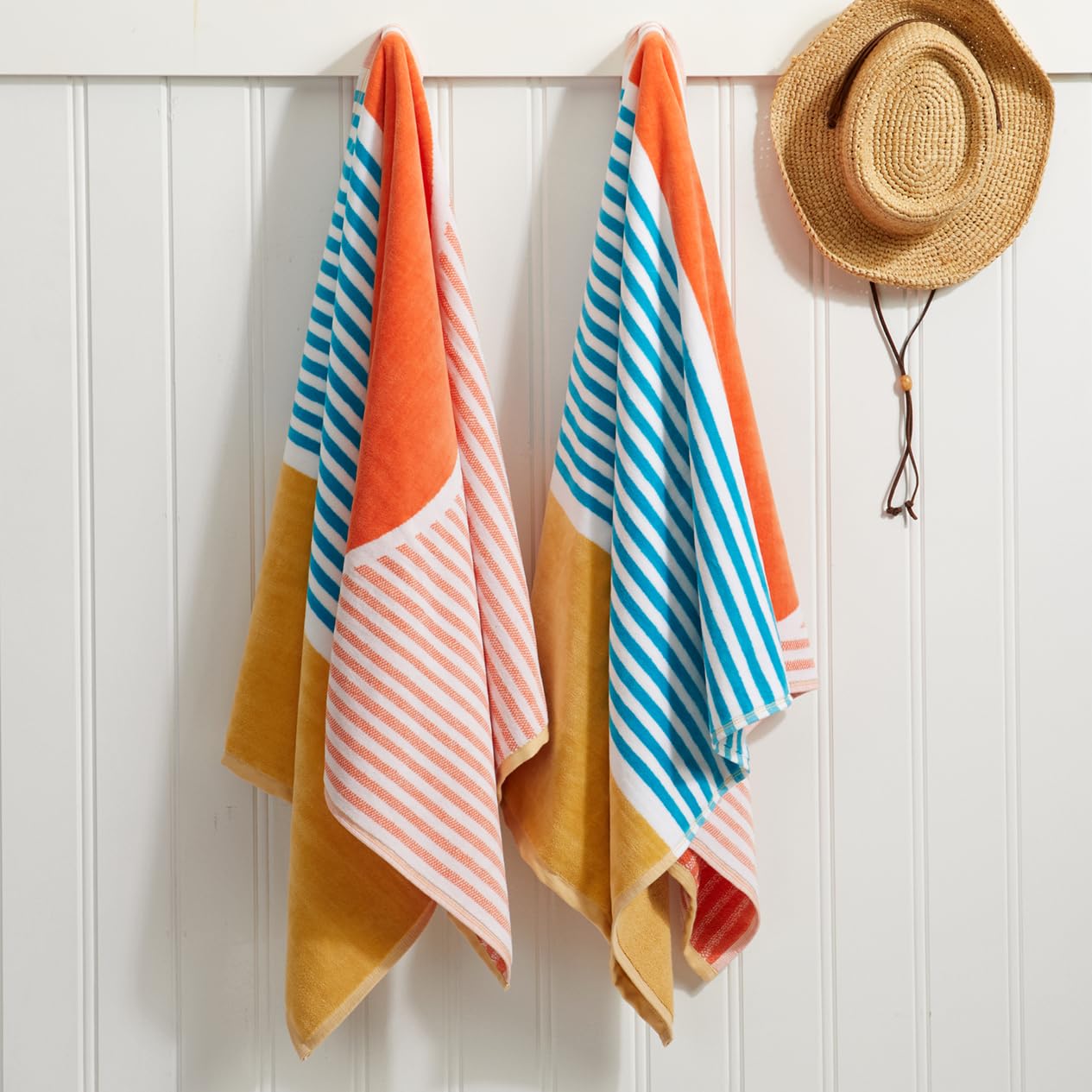 Loon & Lake Beach Sunset towel rolled for travel and compact packing