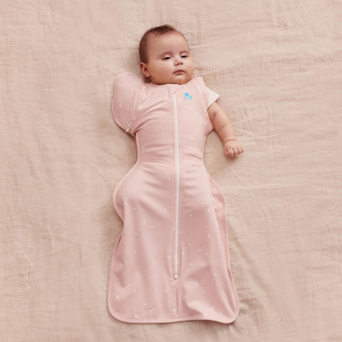 Powder Pink Twinkle transition bag worn by baby during sleep for secure shoulders and comfortable fit.
