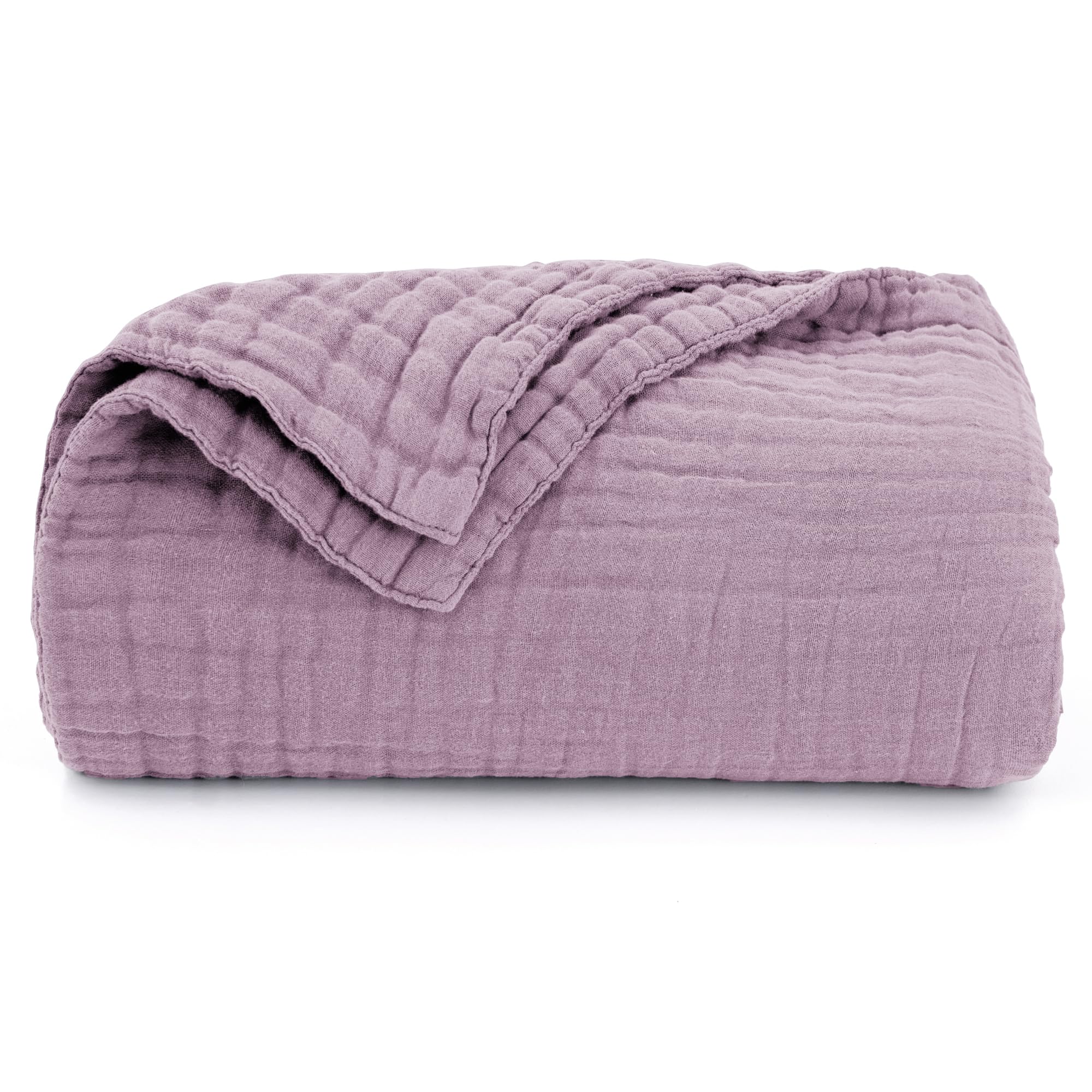 Love's cabin six-layer muslin feels breathable and lightweight across seasons.