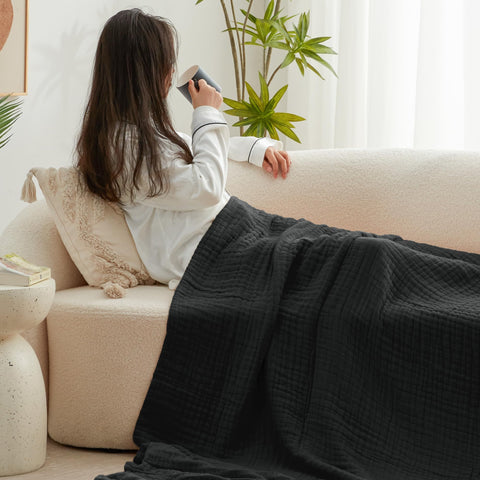 Love's cabin blanket on bed demonstrates versatile, cozy layering.