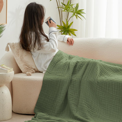 Love's cabin blanket laid across a twin bed for full coverage