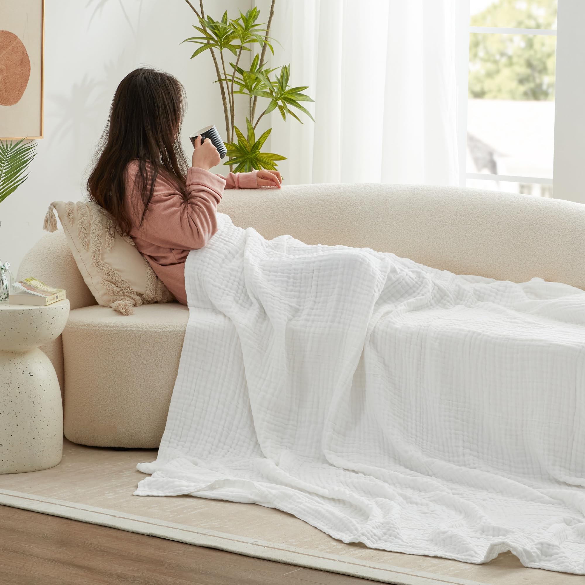 Love's cabin white blanket spread on bed for a soft cozy night’s rest.