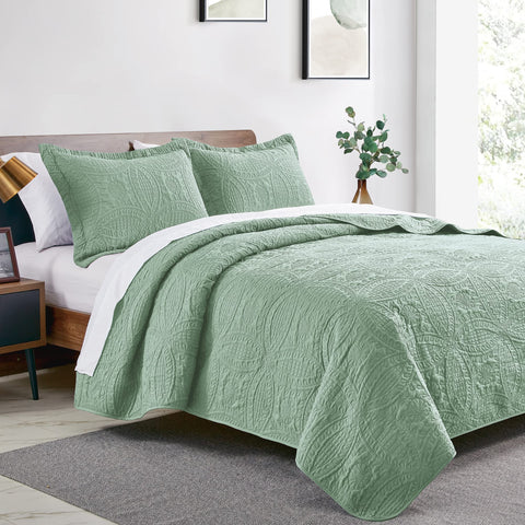 Love's cabin coin-pattern coverlet close-up shows embossed texture and durability.