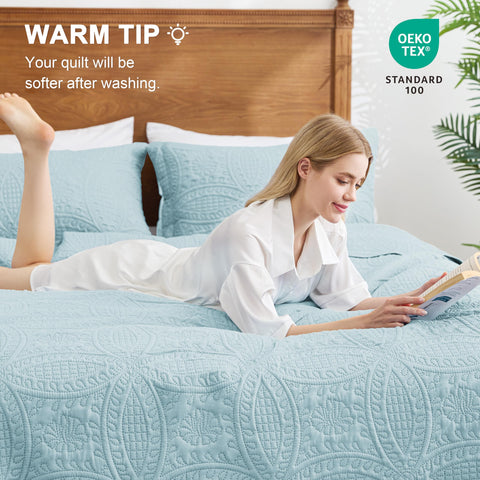 Love's cabin lightweight coverlet folded on bed, showing all-season versatility.