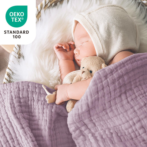 Love's cabin 6-layer muslin blanket folded on twin bed for easy storage