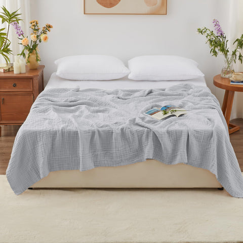 Love's cabin king-size muslin blanket provides generous coverage for a bed.