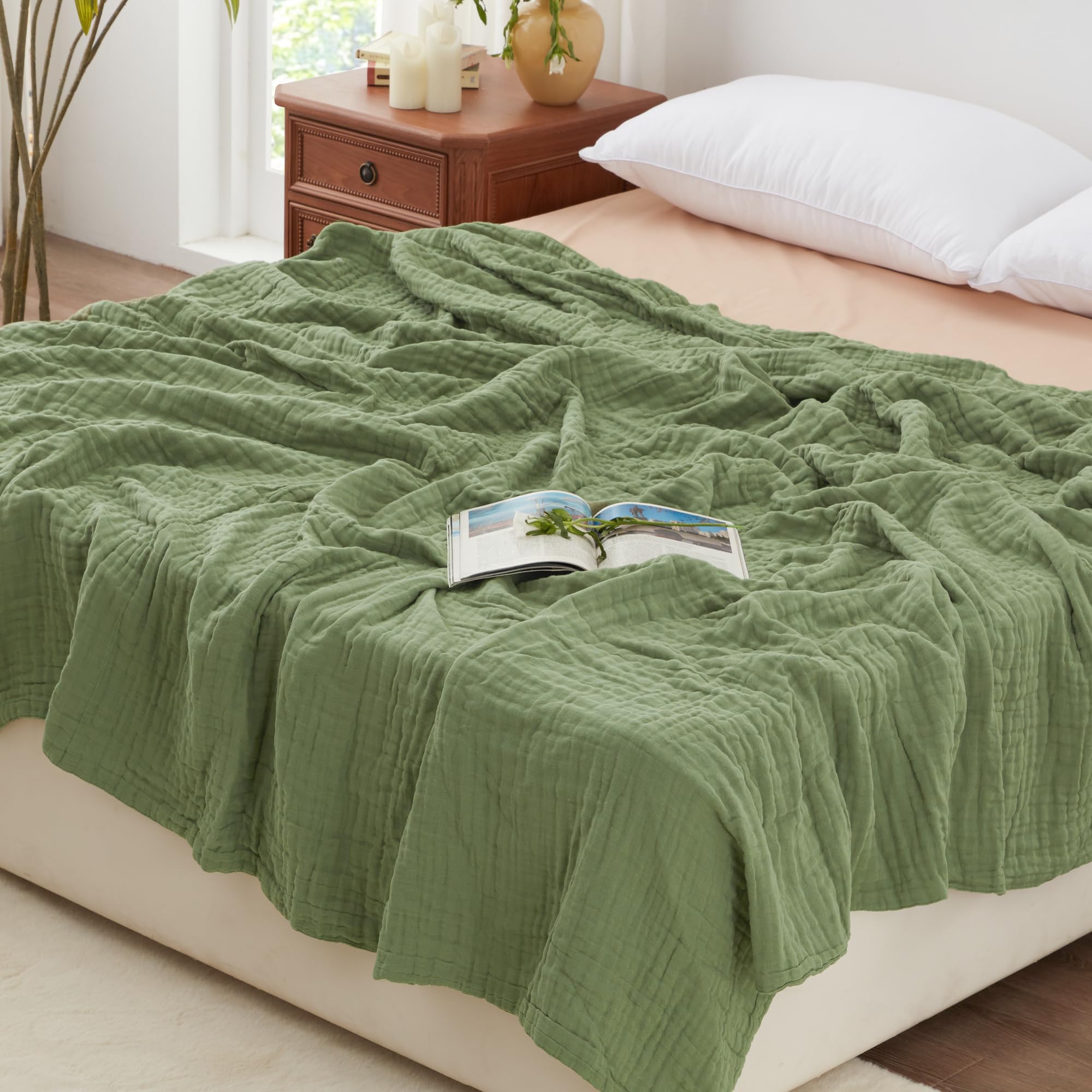 Love's cabin muslin blanket six-layer sage close-up shows soft breathable texture