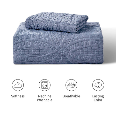 Love's cabin quilt set in blue in a pet-friendly bedroom setup.