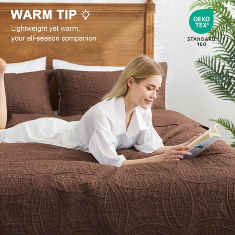 Love's cabin queen bed brown coverlet displayed on a neatly made bed