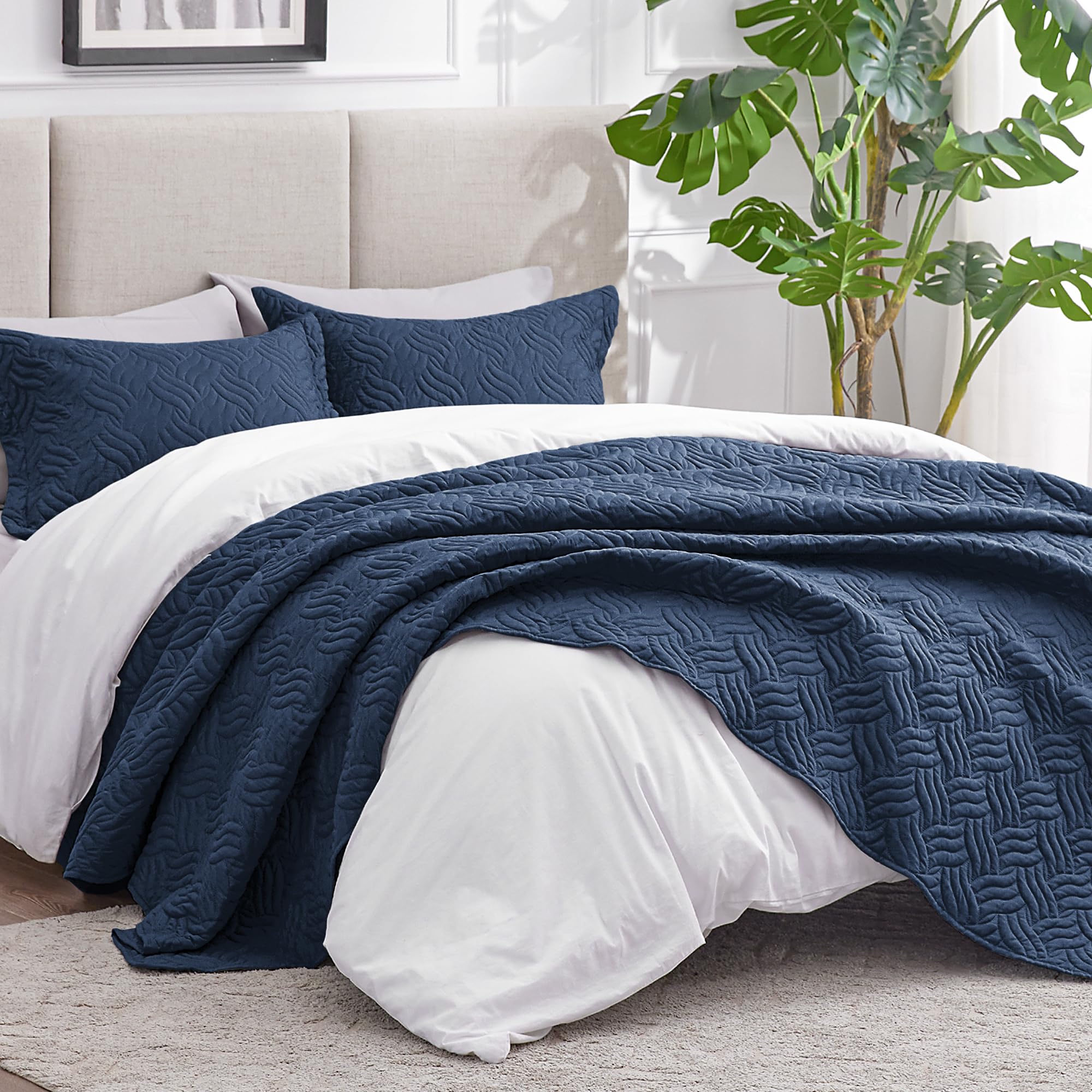 Love's cabin navy quilt close-up shows soft brushed polyester texture
