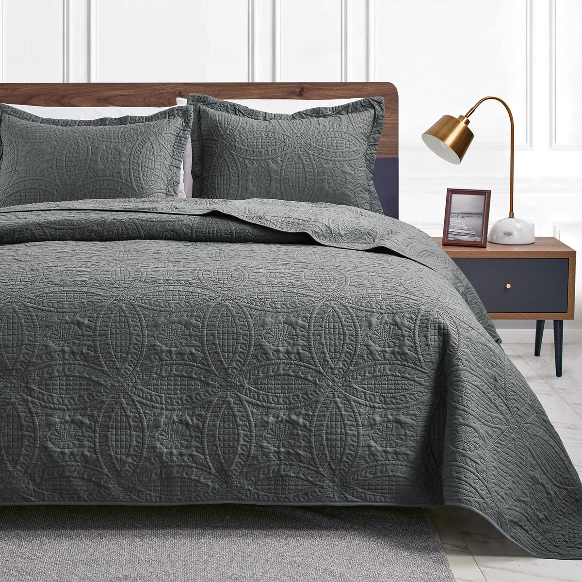 Love's cabin queen quilt in dark grey with coin pattern for all-season bedding.
