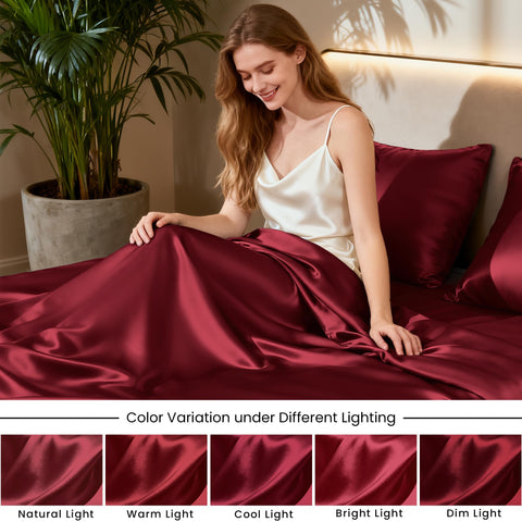 Love's cabin satin queen sheets on burgundy bed showcase rich color and cozy vibe.