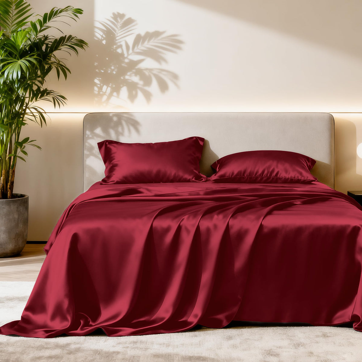 Love's cabin satin queen flat sheet in burgundy with a silky finish for smooth skin contact.
