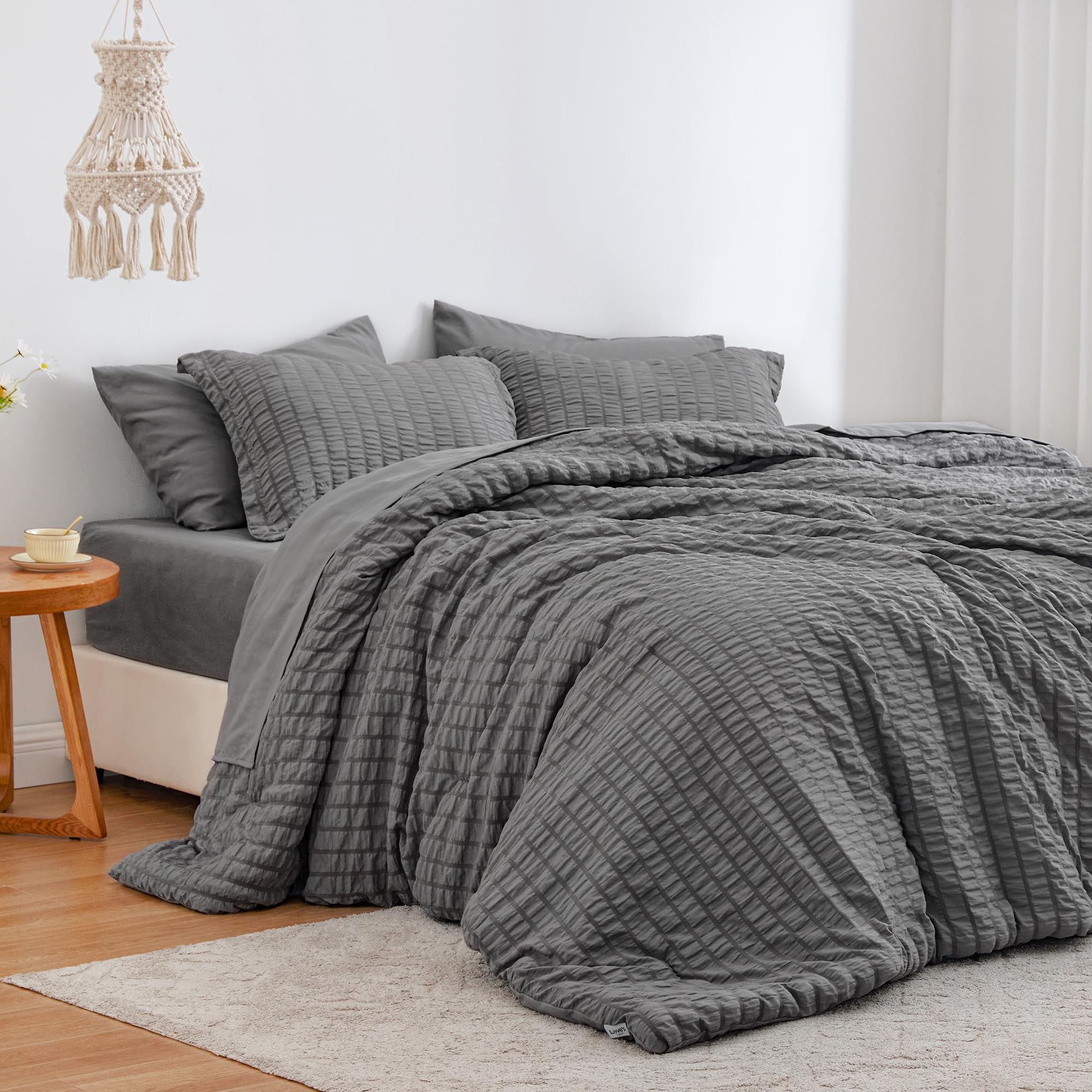 Love's cabin seersucker dark grey king comforter set showing wave texture for all-season coziness