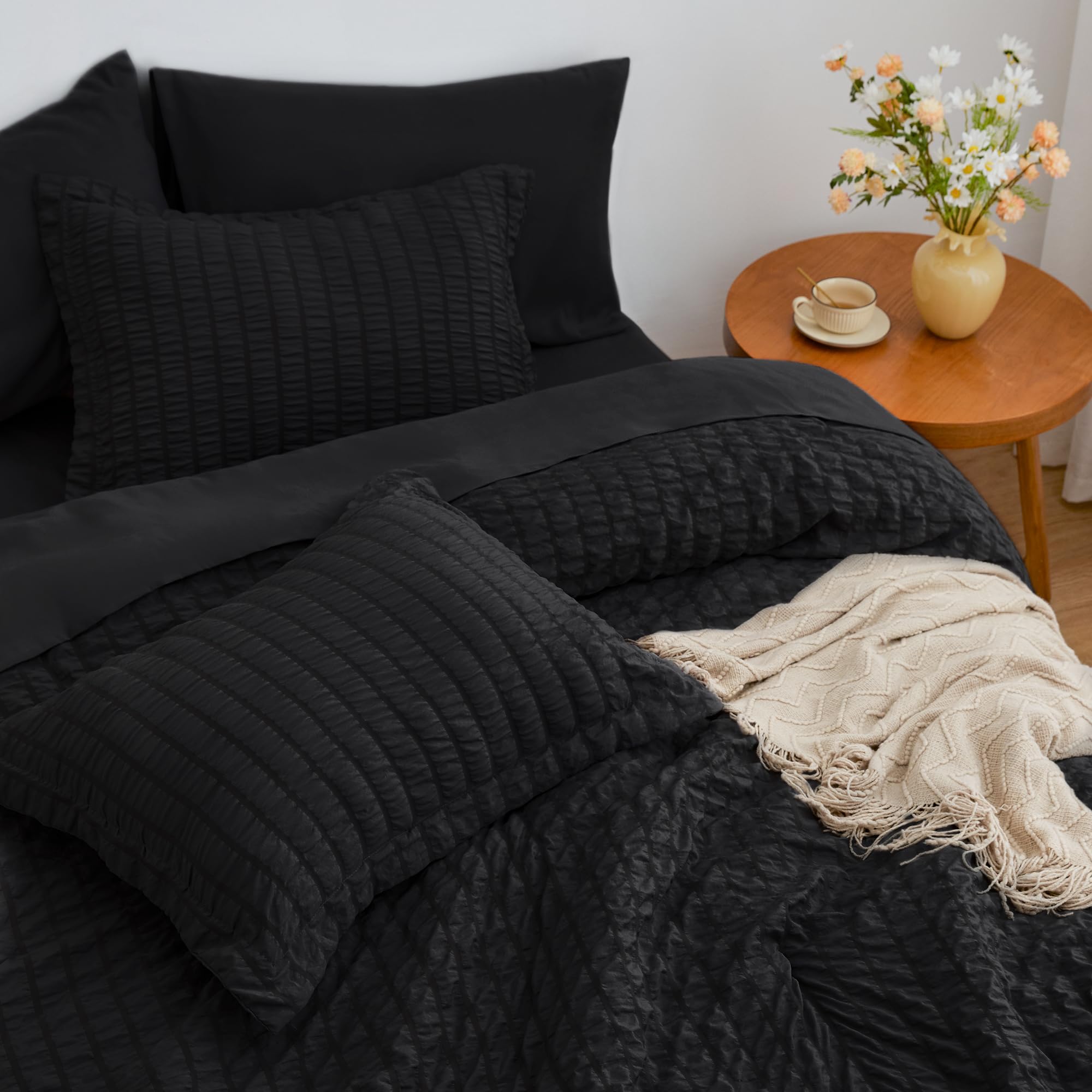 Love's cabin seersucker king pillowcases promote gentle nighttime airflow for a refreshed morning.