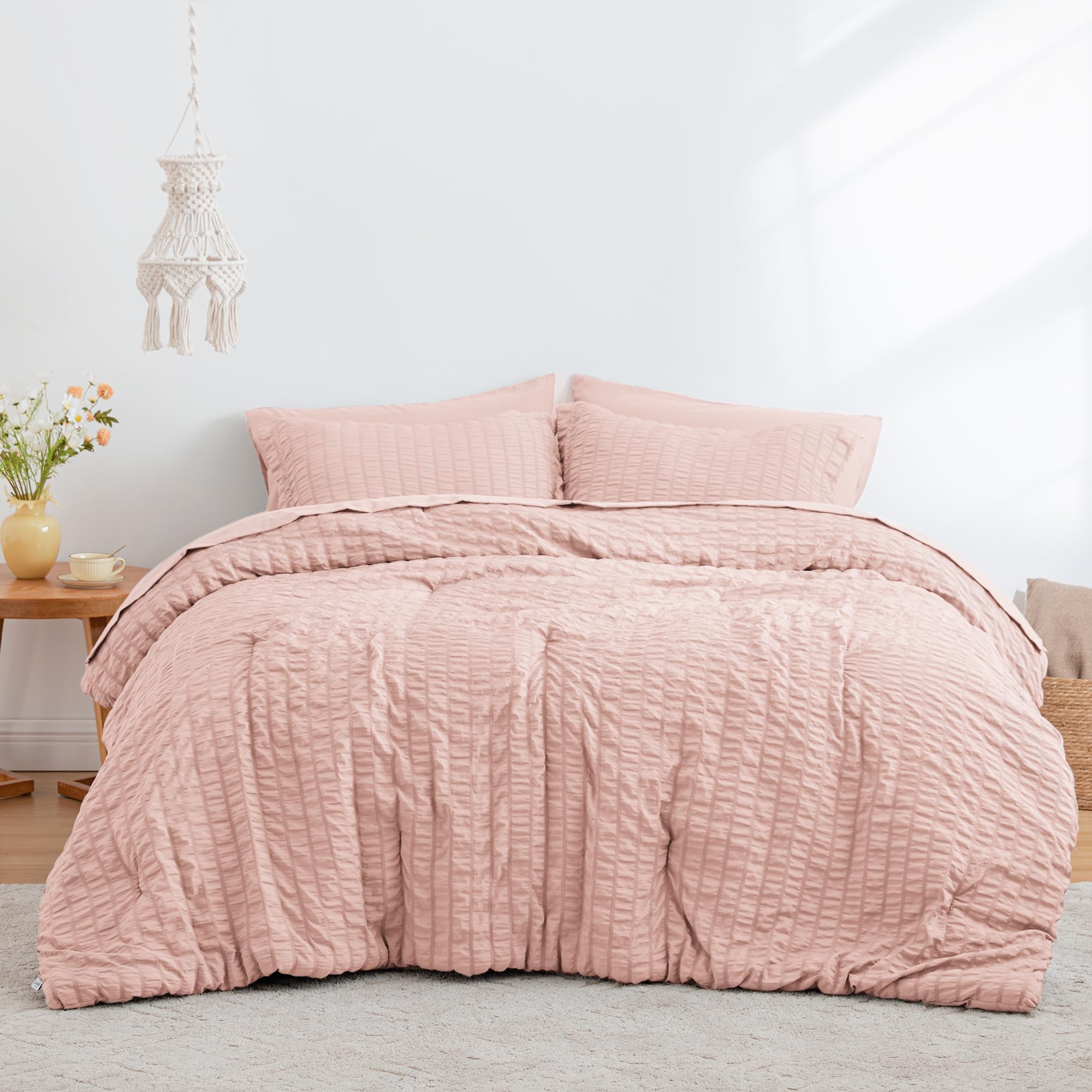 Love's cabin seersucker pink twin flat sheet demonstrates breathable, all-season comfort.