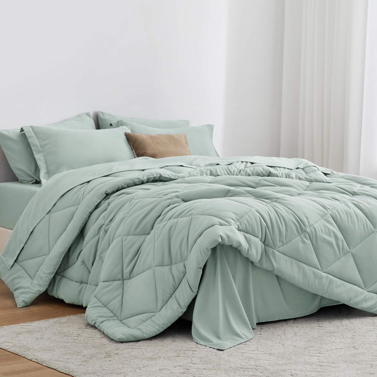Love's cabin twin comforter aqua set on bed for all-season comfort.