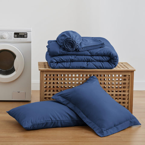 Love's cabin Twin Comforter Set Dark Blue bed-in-a-bag on a tidy twin bed.