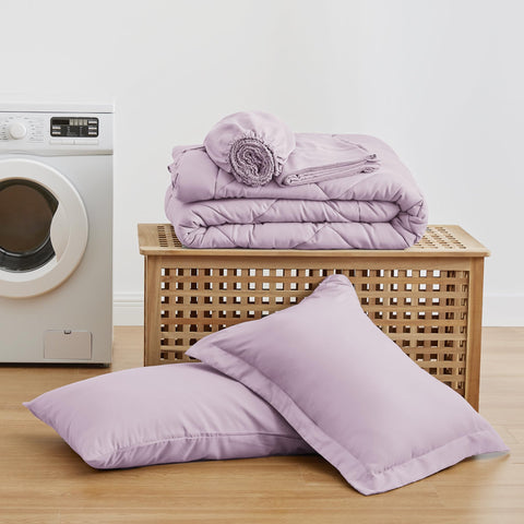 Love's cabin twin comforter set in a cozy bedroom setup suggests all-season comfort