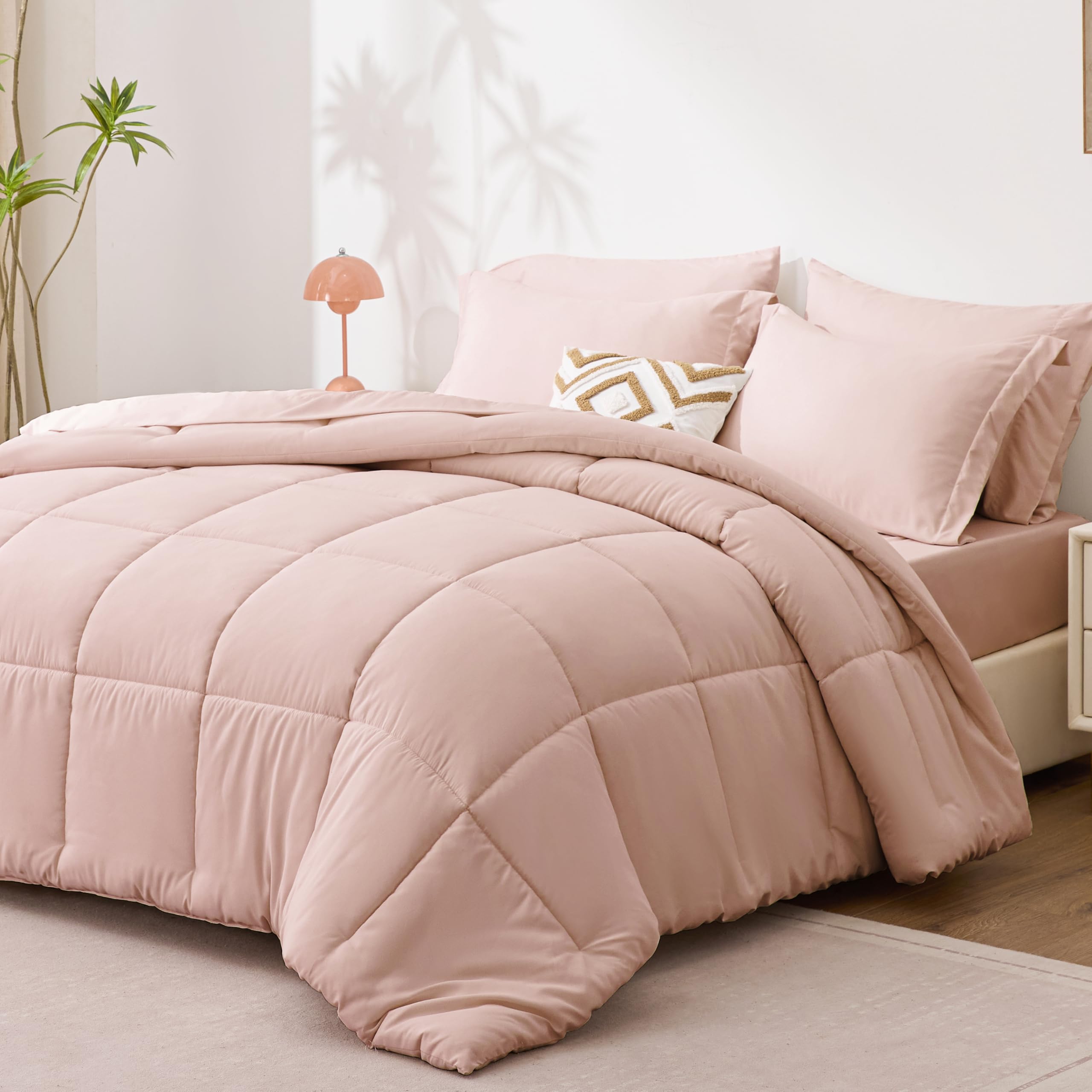 Love's Cabin blush pink flat sheet laid flat for a smooth, breathable sleep surface.