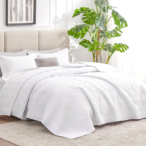 Love's cabin wave pattern coverlet highlighting texture and breathable design.
