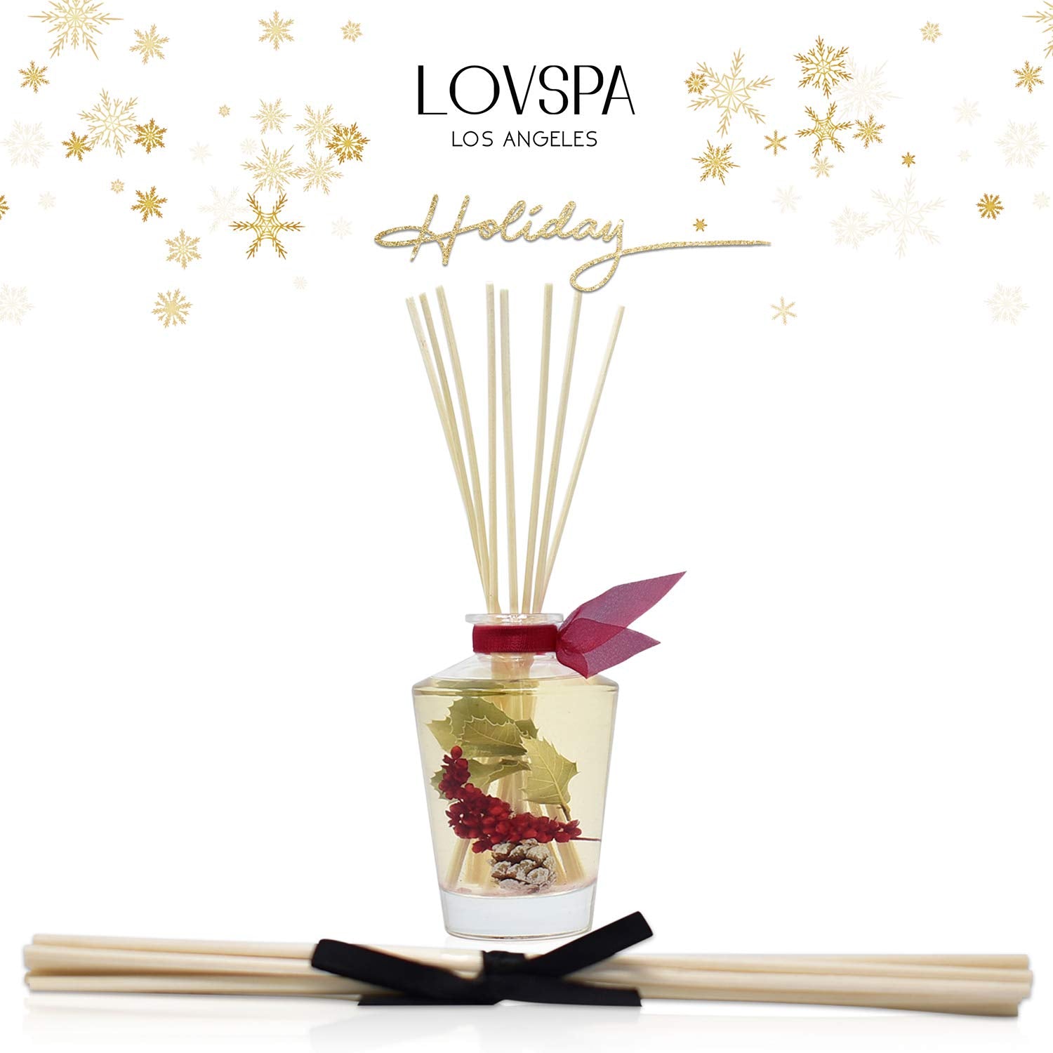 LOVSPA glass diffuser with eight reeds ready for flameless ambient scent in living spaces.
