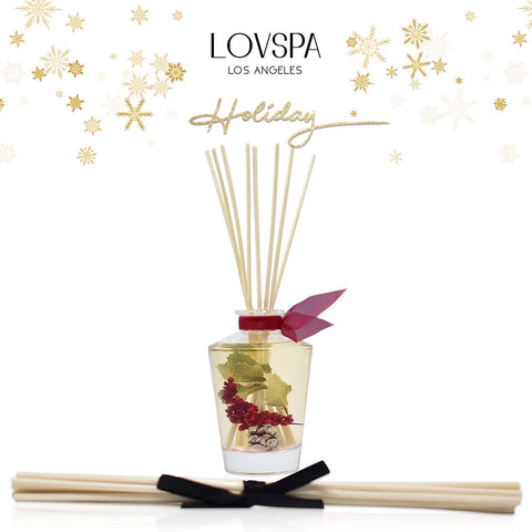 LOVSPA glass diffuser with eight reeds ready for flameless ambient scent in living spaces.
